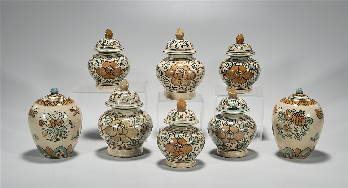 Group of Eight Chinese Hand Painted Ceramic Covered Jars