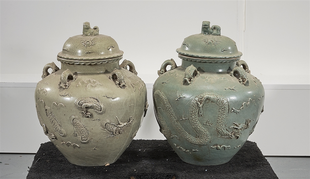 Two Chinese Green Glazed Ceramic Covered Jars