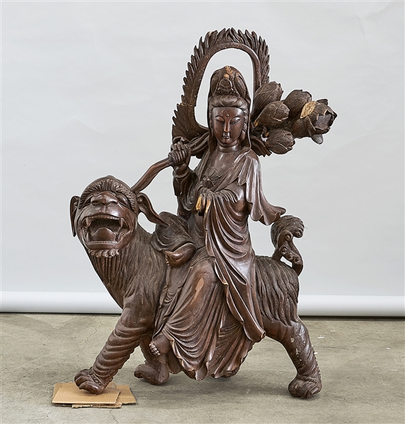 Chinese Wood Sculpture of Guanyin Riding a Foo Lion
