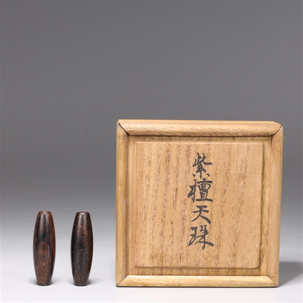 Two Chinese Carved Wood Beads