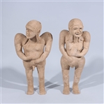 Pair of Chinese Early Style Pottery Figures